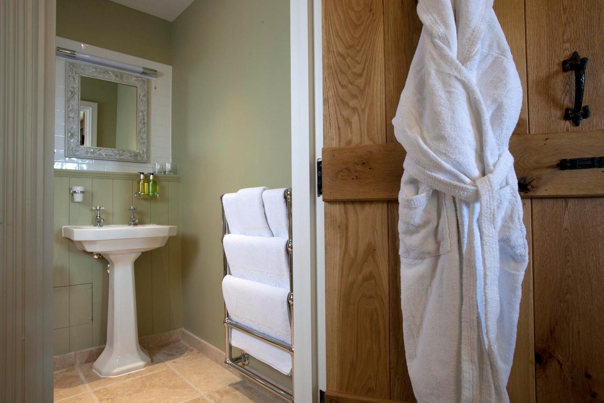 The Three Crowns Hotel Chagford Exterior photo A bathrobe hanging on a door