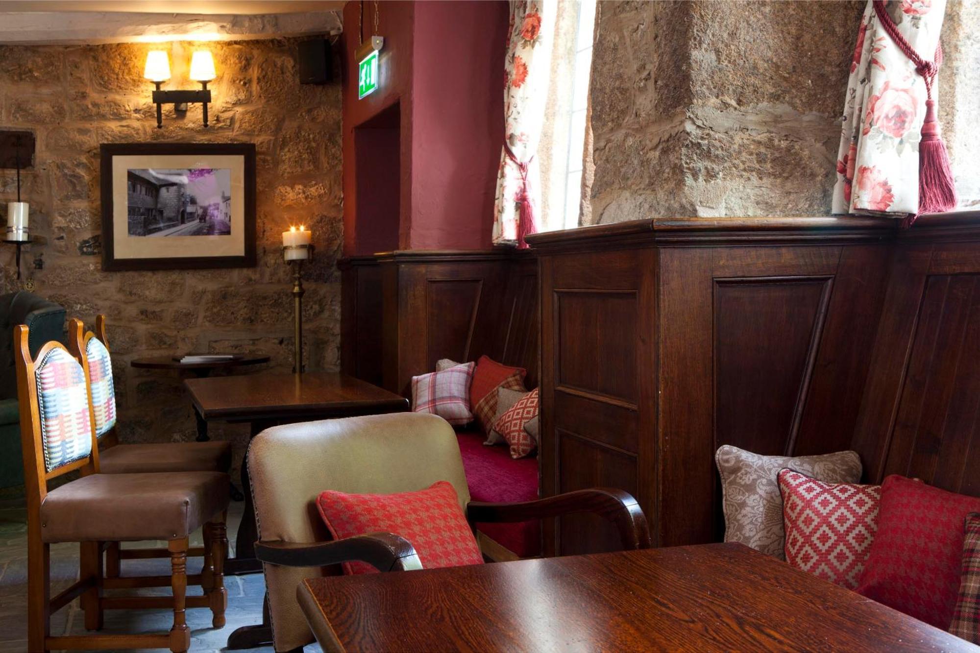 The Three Crowns Hotel Chagford Exterior photo The interior of the pub