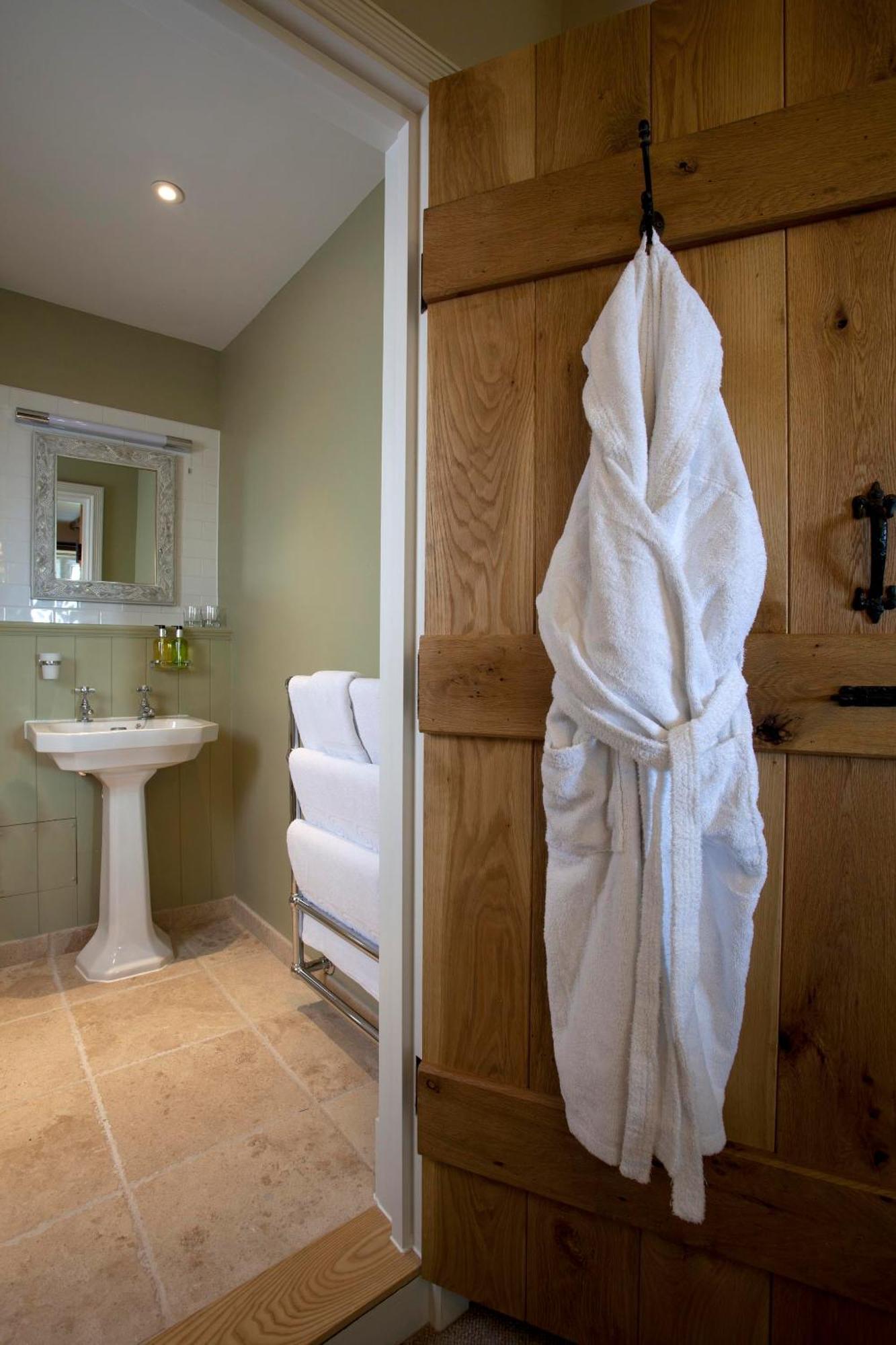 The Three Crowns Hotel Chagford Exterior photo A bathrobe hanging on a door